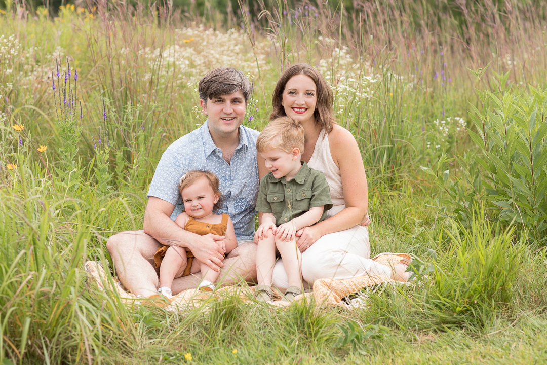 Family portrait in a wildflower meadow